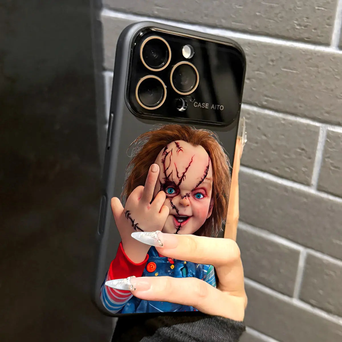 Chucky Creepy Gesture Pattern Dopamine Ins Style Solid Color Phone Case with Ultra Skin friendly Touch, All Inclusive Lens Phone Case Suitable for iPhone 17 16 15 14 13 12 Pro Max Air